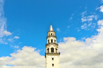 Fototapeta na wymiar Ancient white factory tower in the Urals