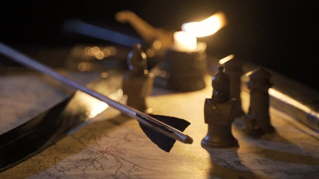 Candlelight battle map in ancient times.
Making a battle plan by candlelight.
