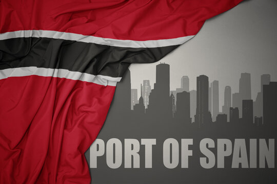 abstract silhouette of the city with text Port of Spain near waving national flag of trinidad and tobago on a gray background. 3D illustration