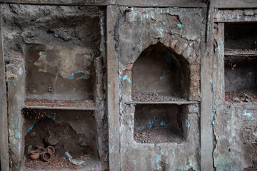 Old broken vintage house shelves made of mud bricks in Maharashtra, India