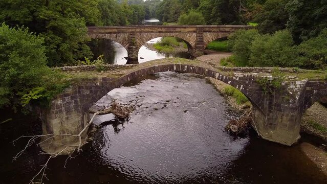 aerial view cromwells bridge and lower hodder bridge over stream