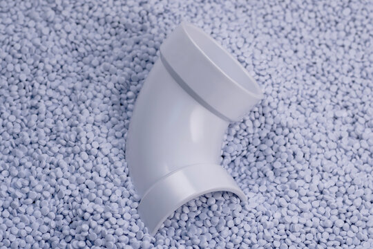 DWV - PVC fittings for waterways, white on PVC raw material background