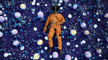 An astronaut laying down on the ground of alien planet and relaxing, 3d rendering  © Василь Чейпеш