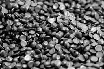 Dark gray PVC raw materials background. PVC fitting