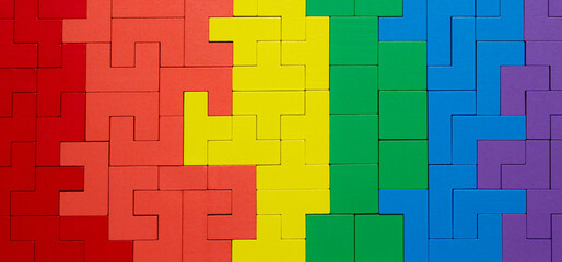 LGBTQ background , wood block puzzle with rainbow color shade