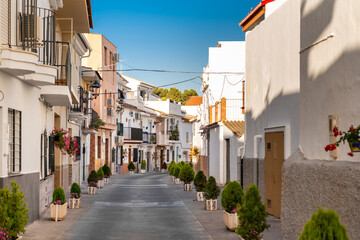 Streets of city of Alhaurin de la Tore, situated in south of Spain in Malaga province. Typically Andalusian small streets with white houses 