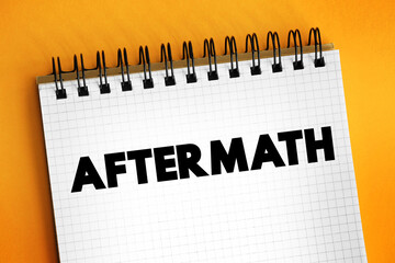 Aftermath text on notepad, concept background