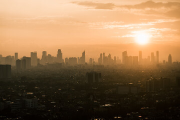 Obraz na płótnie Canvas Sunset Over The City