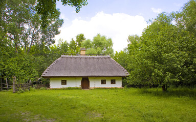 Fototapeta na wymiar Traditional Ukrainian house of the 17-18th century in Cossack village (museum) Mamaeva Sloboda in Kyiv, Ukraine
