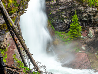 Obraz na płótnie Canvas Closeup of a waterfall in Glacier National Park