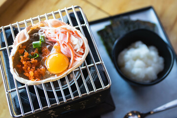 Japanese food, Krab boiled grill Kani Miso grill on the stove. © kannapon