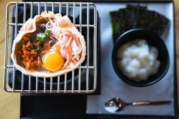 Japanese food, Krab boiled grill Kani Miso grill on the stove. © kannapon
