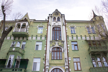 Decorated facade of an old house with cats in Kyiv, Ukraine	
