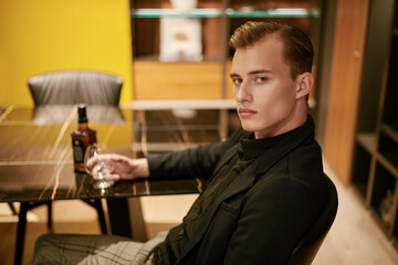 male drinking whiskey