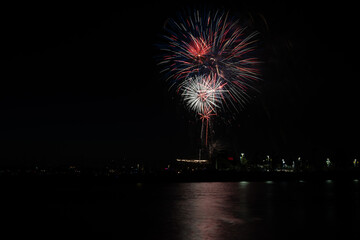 Fireworks shoot over Alamitos Bay in Long Beach to celebrate July 4th holiday.