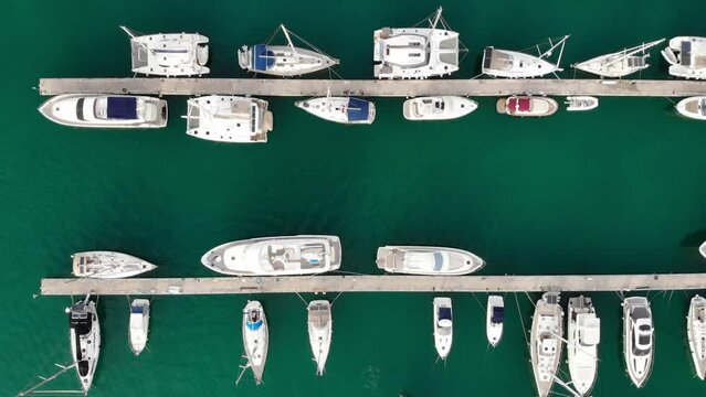 Sea travel concept. Aerial shot, above of the marina with yachts