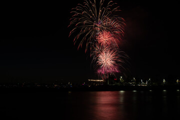 Fireworks shoot over Alamitos Bay in Long Beach to celebrate July 4th holiday.