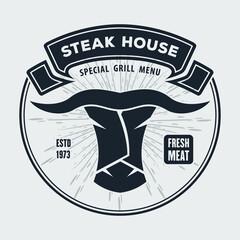 Steakhouse logo design with bull head. Vector illustration
