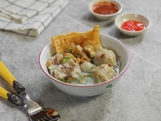 Bakso or baso is an Indonesian meatball, Its texture is similar to the Chinese beef ball, fish ball, or pork ball. Selective focus