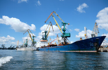 Fototapeta premium Kherson, Ukraine. Cargo ship in the port.