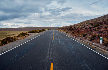Fototapeta na wymiar Asphalt road in the Andes.
