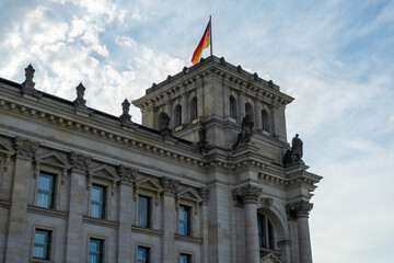 Fototapeta na wymiar German flag on the Reichstag building. German flag