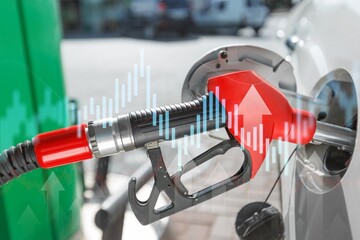 Car with a fuel nozzle and rising chart showing gasoline price increase during energy crisis in the world concept