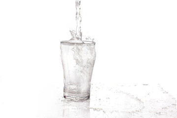 Pouring water into a glass