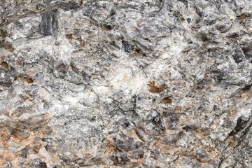 Texture of a colorful glossy natural stone as a background