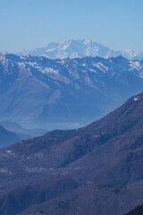The mountains of Valtellina during a sunny winter day, near the town of Sondrio, Italy - January 2022