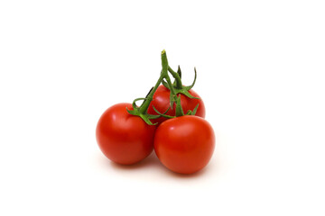 Cherry tomatoes on a white background. Shallow depth of field