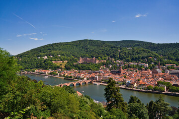 Fototapeta na wymiar Heidelberg town with Neckar river, Germany. Heidelberg town with the famous Karl Theodor old bridge and Heidelberg castle, Heidelberg, Germany.