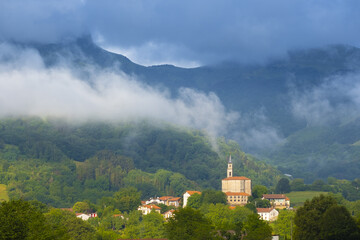 Municipality of Elizmendi with Mount Hernio in the clouds, Euskadi