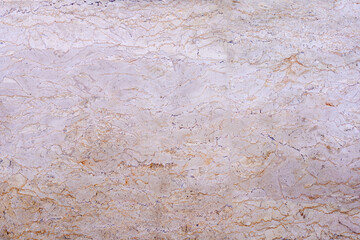 Fototapeta premium Textured wall lined with shell rock tiles.
