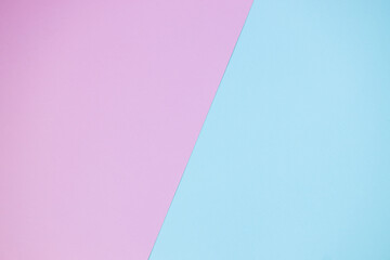 multicolor paper background in pink and blue