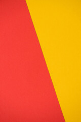 Bright abstract geometric paper background. Yellow and red trendy colors. The backdrop for an...