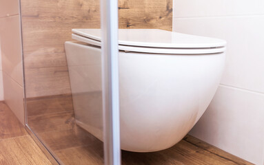 white toilet close-up in a modern bathroom. Sanitary equipment for a modern home