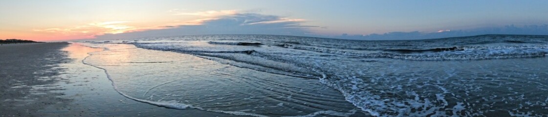 Obraz na płótnie Canvas Roiling Beach Ocean Sunrise Stacking Waves Panorama