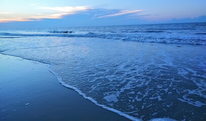 Fototapeta premium Beach Ocean Sunrise Foam-Edged Waves