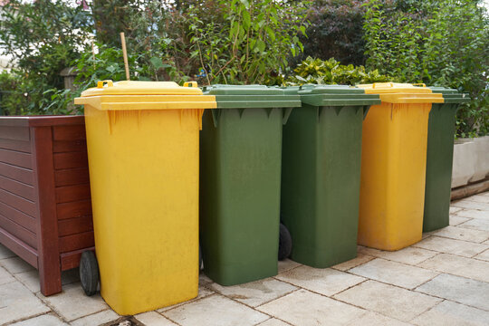 Several trash plastic bins for sorting waste