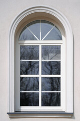 Beautiful arched window in building, view from outdoors