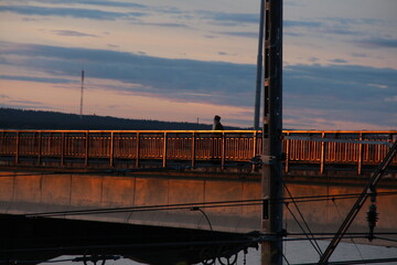 man stand on the bridge