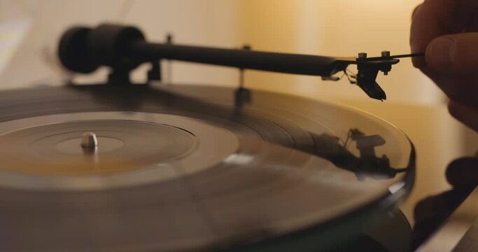 Close up of vinyl record spinning on turntable 