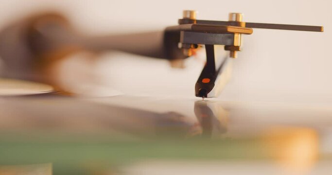 Close up of vinyl record spinning on turntable 
