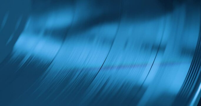 Macro close up of vinyl record texture while spinning on turntable 