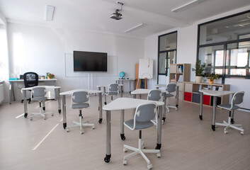 Rear view of empty classroom for at school
