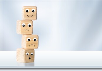 Customer service evaluation and satisfaction concepts. happy face smile face symbol on wooden blocks. Review, Rating, Satisfaction concepts