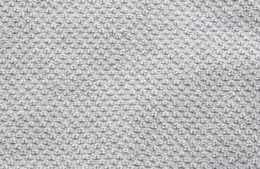 Background - gray textile with pronounced texture.
