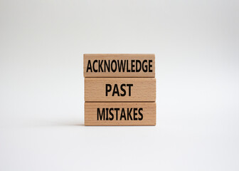 Acknowledge Past Mistakes symbol. Wooden blocks with words Acknowledge Past Mistakes. Beautiful white background. Business and Acknowledge Past Mistakes. Copy space.