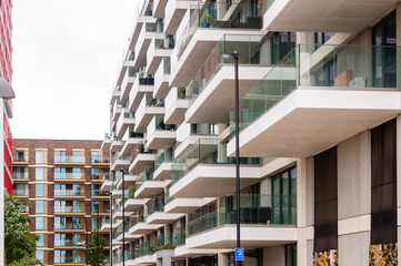 Obraz premium Riverscape Luxury new-build riverside apartments in Silvertown, Newham, London, England, June 19, 2022